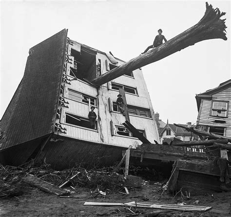 A Tree Protrudes From A House Tossed By The Flood Image Bettmann
