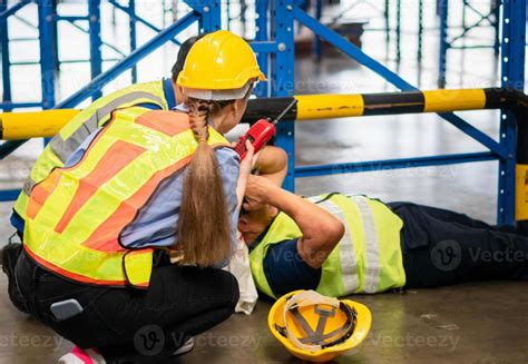 Accident At Work Concepts Foreman Workers Taking Care About Their Colleague Lying On The Floor