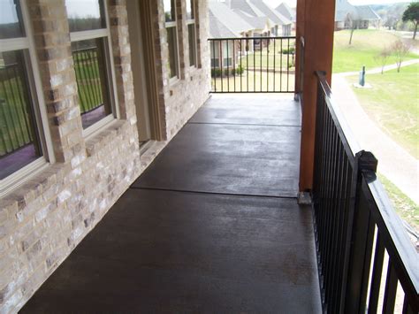 Polished concrete floors save facilities a ton of money in maintenance costs. Stained Concrete, 2nd Floor Balcony, Black Stain.