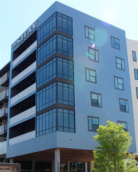 All metal products are tension leveled for superior flatness. The Shay Apartments have a beautiful Fluted Fascia ...