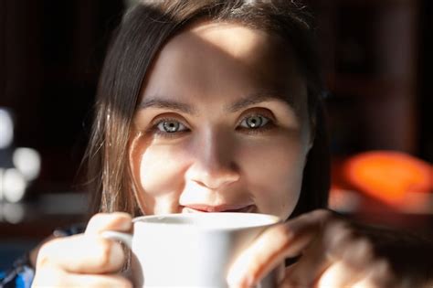 Premium Photo Beautiful Woman Drinking Coffee In A Morning At Cafe