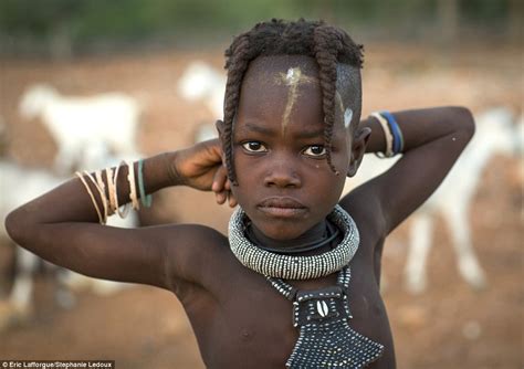 Thats An Unusual Look Namibias Himba Tribeswomen Sport Incredible Hairdos Created Using Goat