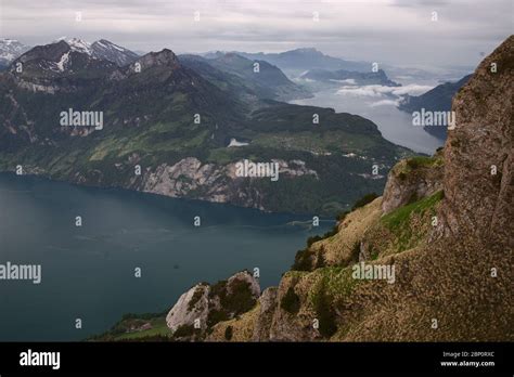 Panorama From Fronalpstock Mountain Peak Overlooking Lake Lucerne And A
