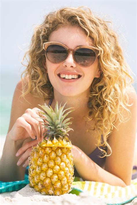Woman Lying At Beach While Having Pineapple Stock Photo Image Of Calm
