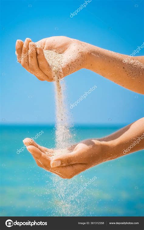 Hands Pouring Sand Sea Stock Photo By ©kostia777 361312358