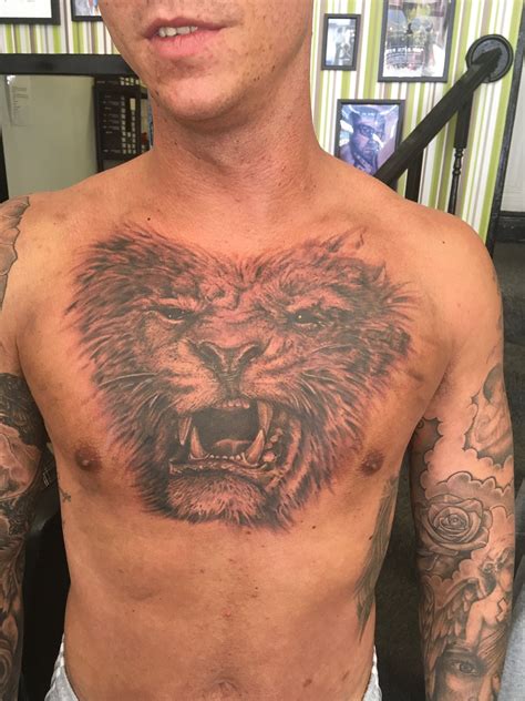 Be careful to speak to the tatted man, he is willing to fight to the death. Lion chest piece (in progress) | Chest piece, Tattoo work ...