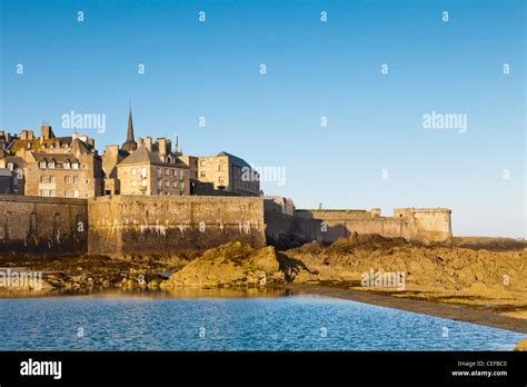 Rocky Beach At St Malo Brittany France In Front Of The Old Town And