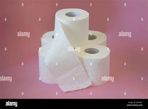 Rolls Of White Toilet Paper On A Pink Background Stock Photo Alamy