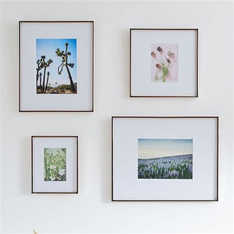 Modern float frames or other minimalist styles are perfect if you're looking for something a little more unexpected. Gallery Picture Frames - Polished Rose Gold | west elm