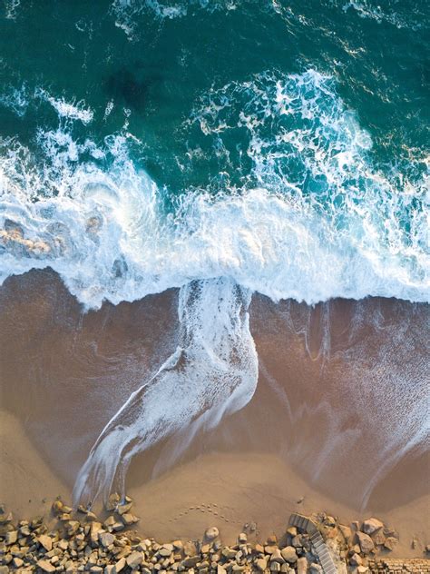 Top View Of Ocean Wave On Seashore Photo Free Ocean Image On Unsplash