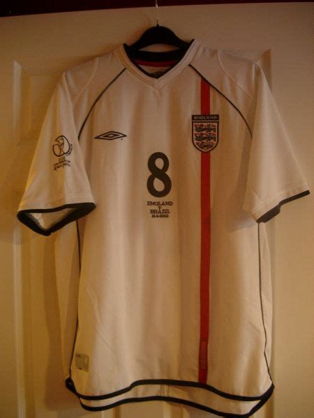 Gérard houllier in charge, owen up to and new signings fresh 1966 england germany retro umbro away football shirt word cup 66 (l/xl). England Special football shirt 2002.