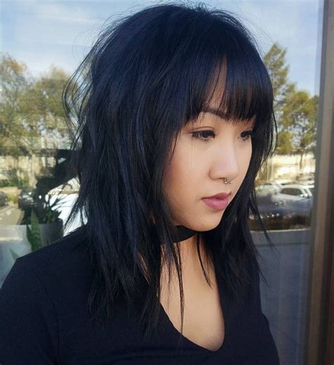 Black Shag With A Wispy Fringe Bangs For Round Face Short Hair With