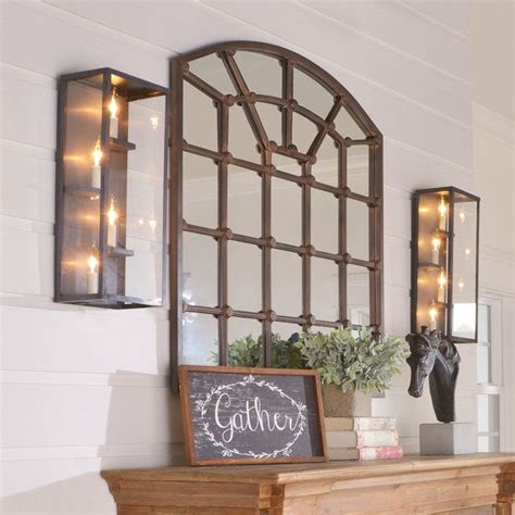 This Stunning Arched Iron Mirror Has An Antique Appearance That Brings