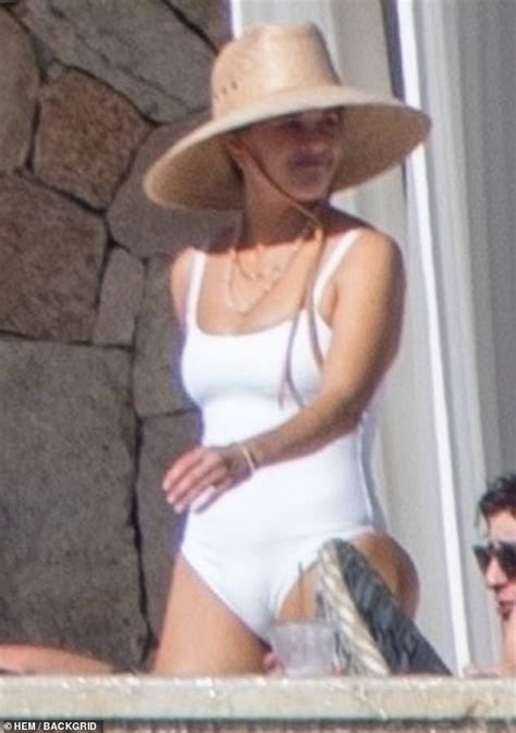 Reese Witherspoon Wows In A Chic White Swimsuit As She Enjoys A Beach Getaway In Mexico During