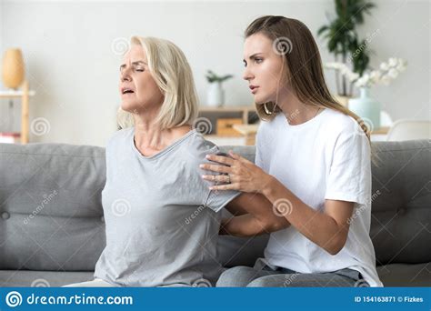 Alleged dad and daughter on webcam. Mother Suffering From Back Pain Daughter Feeling Worry Stock Image - Image of mother, muscle ...