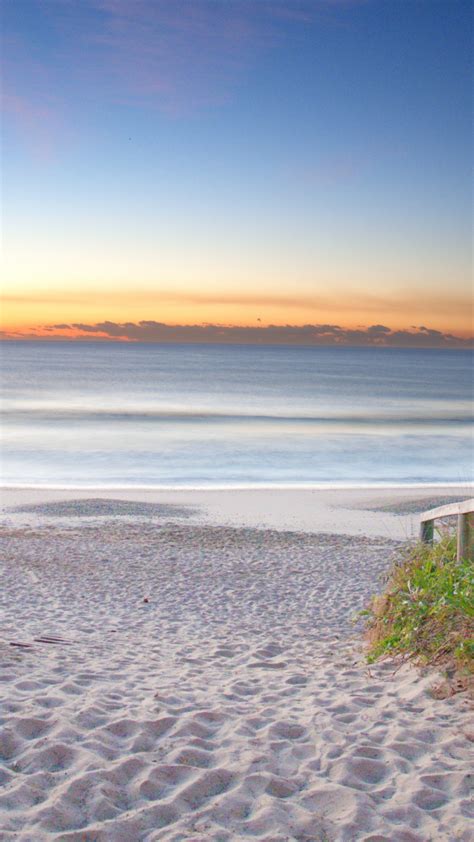 Download Wallpaper 720x1280 Sand Beach Sunrise Sky Beautiful
