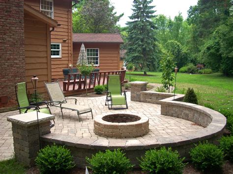 8 ideas for sprucing up the backyard with raised beds, planters, even synthetic turf! Backyard Fire Pit - Traditional - Patio - Cleveland - by ...