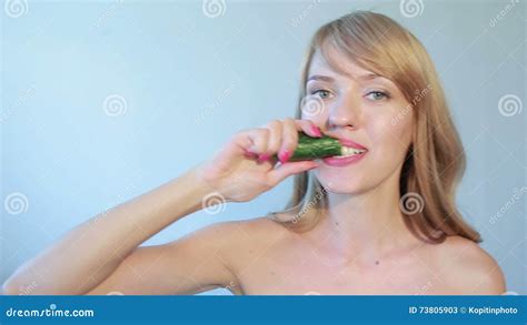 Young Woman Eating Cucumber A Close Up Of Beautiful Girl Eating Cucumber Stock Video Video Of