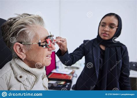 Eye Exam Frame And Senior Woman With Optometrist In Clinic For Vision