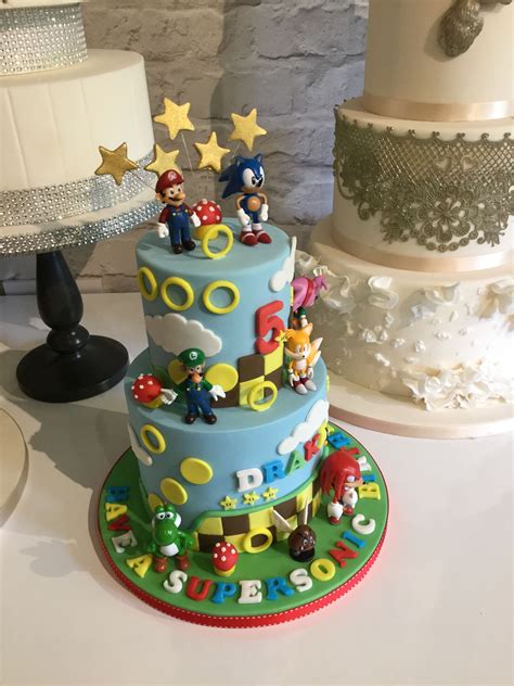 I dyed the icing the colors i needed it to be and spread it in to create the. Super mario and sonic cake | Sonic birthday cake, Mario ...