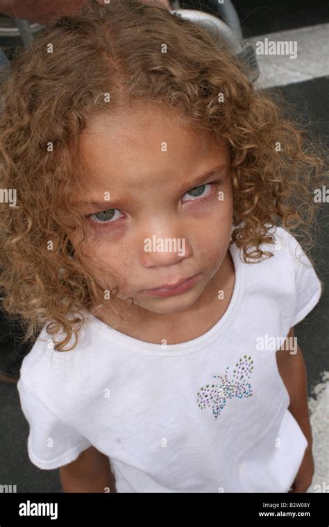 Very Sad Curly Haired Girl Stock Photo Alamy