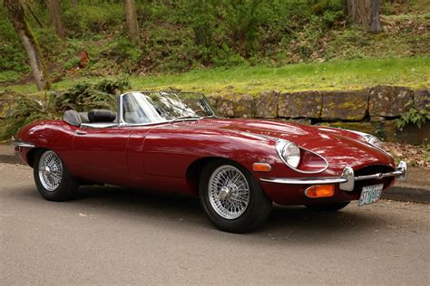Very earlier built cars utilised external bonnet latches which required a tool. 1970 E-Type Jaguar Convertible | Sports Car Shop