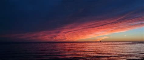 2560x1080 Sea Ocean Sunset Reflection Pastel Waves 2560x1080 Resolution