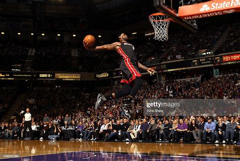 Official nba basketball lebron james dunking miami heat framed photograph. LeBron James of the Miami Heat dunks the ball during their ...