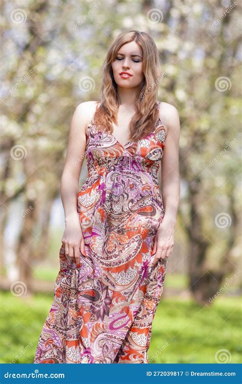 modern lifestyle concepts portrait of winsome blond caucasian adult girl posing outside in