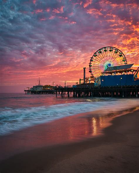 A Fiery Sunset Over Santa Monica Pier Travel Aesthetic Los Angeles