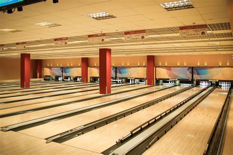 A bowling alley (also known as a bowling center, bowling lounge, bowling arena, or historically bowling club) is a facility where the sport of bowling is played. Free picture: floor, bowling, wood, lighting, architecture ...