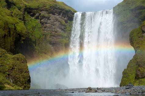 Rainbow In Front Of A Waterfall Art And Pictures