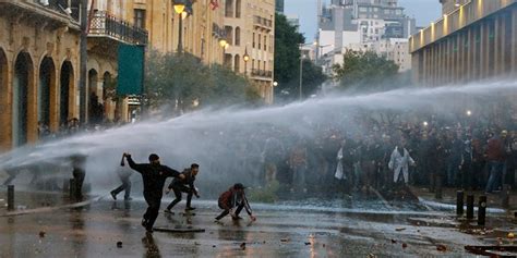 Lebanon Police Fire Tear Gas Spray Water Cannons At Protesters Amid