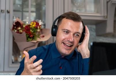 Angry Man Headphones Clenched His Fist Stock Photo Shutterstock