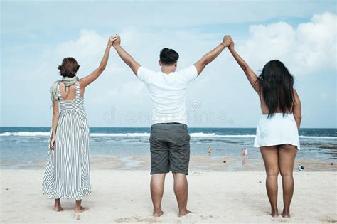 Group Of Multiracial Friends Having Fun On The Beach Of Tropical Bali