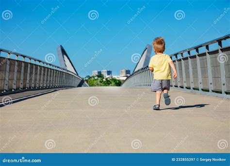 Blond Toddler Boy Run Away On A Path Walk In Park Stock Image Image