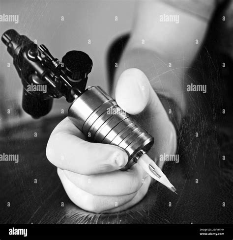 Tattoo Artist At Work Close Up Retro Stylization Stock Photo Alamy