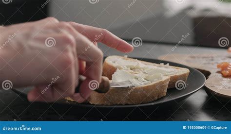 Man Spread Cream Cheese On Ciabatta Slice On Black Plate Stock Image Image Of Parsley Fresh