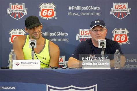 Michael Phelps And Coach Bob Bowman Speak During The 2014 Phillips 66 News Photo Getty Images