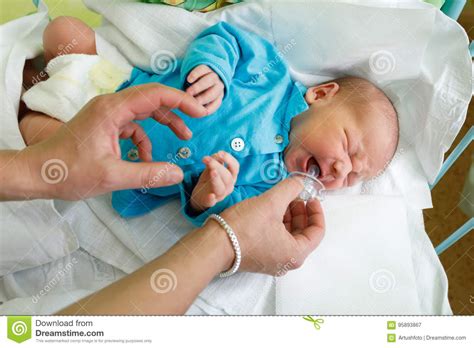 Crying Newborn Baby Infant In The Hospital Stock Image