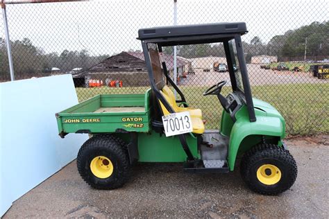 Carries two riders at once! JOHN DEERE GATOR utility vehicle, Selling Offsite: Located in Troy, AL - J.M. Wood Auction ...