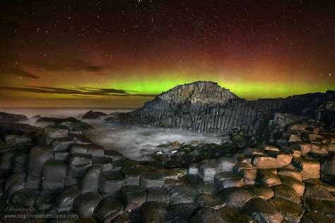 Beautiful Aurora Borealis Over The Giant Causeway By Captive