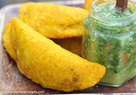 Once the liquid is boiling, lower to a simmer and cook for 15 to 20 minutes, until the chicken is cooked through. Colombian Empanadas (Empanadas Colombianas) | My Colombian ...