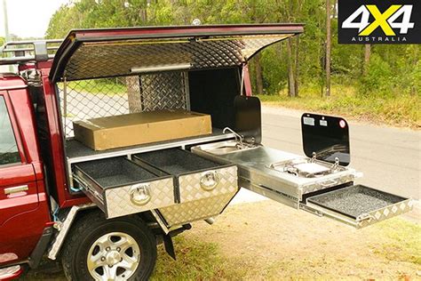 I managed to pick a second hand bull motor bodies canopy for $3800 with a heap of extras, and its been amazing. Canopy storage set-up with sink | Camping canopy, Ute ...