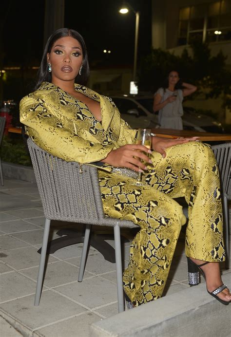 Joseline Hernandez Stuns Posing In White Feathered Dress With High