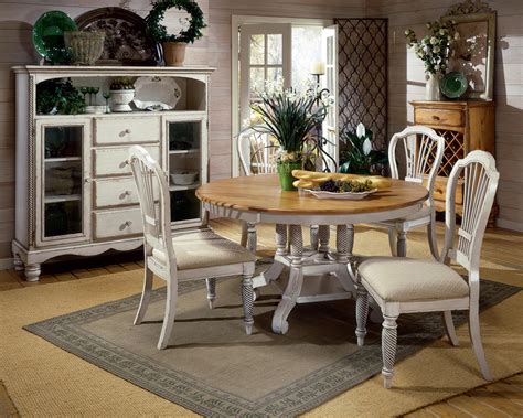 Reviewers mention that this table is both elegant and stable. Beautiful White Round Kitchen Table and Chairs - HomesFeed