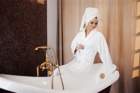 Beautiful Young Woman In Bathrobe And Towel On Head Girl After Bath Stock Image Image Of