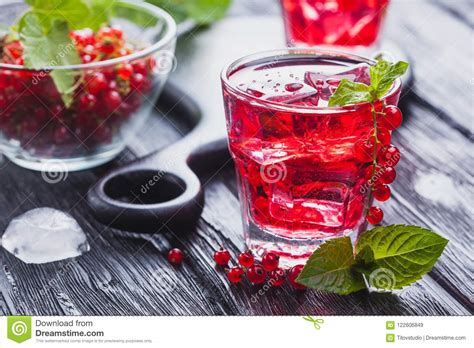 Red Currant Cocktail With Ice And Fresh Mint On A Black Wooden Table Stock Image Image Of