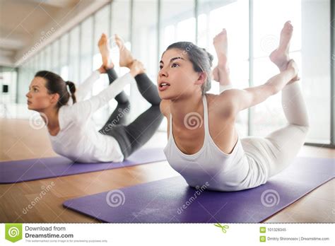 Doing Yoga Bow Pose Stock Image Image Of Indoors Sportswear 101328345