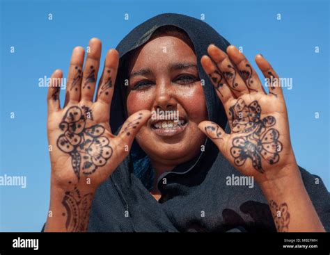 A Somali Woman Showing Her Hand Painted With Henna North Western
